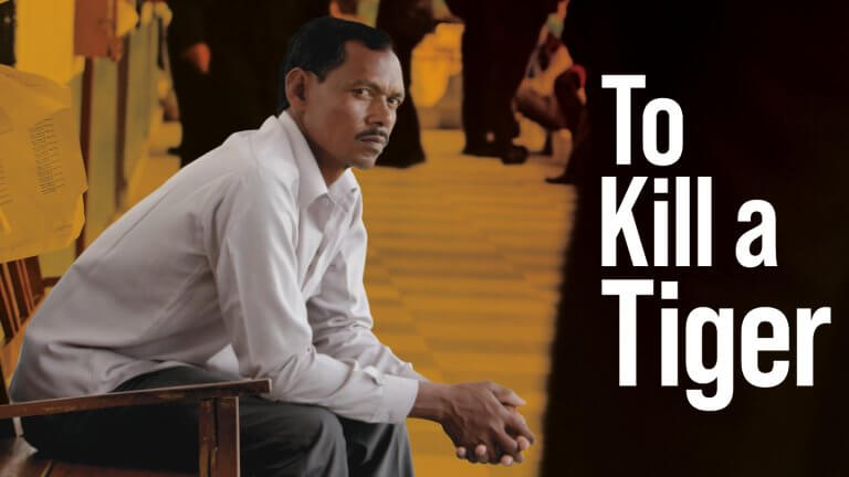 Banner for To Kill a Tiger, featuring Ranjit